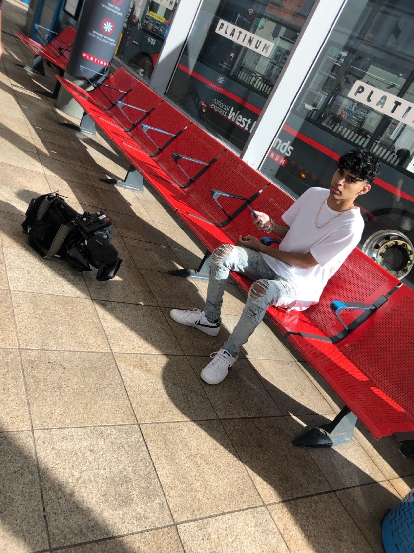 Anish Parmar working with the BBC, ITV & BirminghamTV at Wolverhampton Bus Station in the United Kingdom.